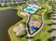 Aerial shot of the lake, playground, and community pool at 11407 Leland Groves Dr, Riverview, FL 33579