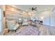 Bright office space featuring decorative wall and an area rug at 11407 Leland Groves Dr, Riverview, FL 33579