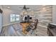 Office space featuring decorative wall and area rug at 11407 Leland Groves Dr, Riverview, FL 33579