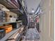 Organized walk-in closet providing ample shelving and storage space for clothes and accessories at 11407 Leland Groves Dr, Riverview, FL 33579