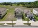 Birds-eye view of a two-story home highlighting the property's placement within a well-maintained neighborhood at 11530 Adam Lee Way, Dade City, FL 33525