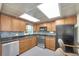 Updated kitchen featuring stainless steel appliances, stylish backsplash, and ample counter space at 1270 Gulf Blvd # 1904, Clearwater Beach, FL 33767