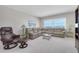 Inviting living room featuring comfortable seating, an ocean view, and neutral colors creating a cozy atmosphere at 1270 Gulf Blvd # 1904, Clearwater Beach, FL 33767