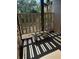Private outdoor patio area with shade from tree and privacy lattice at 12809 Wedgewood Way # A, Hudson, FL 34667