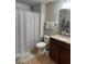 Bathroom featuring a shower with modern fixtures and a granite countertop vanity at 1438 Mallory Sail Pl, Brandon, FL 33511