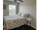 Bedroom with bright natural light, a full bed and dark wood flooring at 1438 Mallory Sail Pl, Brandon, FL 33511