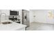 Modern kitchen featuring quartz countertops and stainless steel appliances at 1513 Escort Ave, Tampa, FL 33610