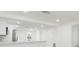 Modern kitchen features new stainless steel appliances and white cabinetry at 1513 Escort Ave, Tampa, FL 33610