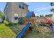 Backyard featuring a playground with a slide and tire swing at 16717 Myrtle Sand Dr, Wimauma, FL 33598
