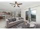 Open-concept layout with comfortable living room and kitchen views at 16717 Myrtle Sand Dr, Wimauma, FL 33598
