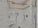 Stunning shower with double rainfall shower heads, gray accents, and a built-in bench at 1806 Mira Lago Cir, Ruskin, FL 33570