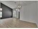 Spacious living room featuring light wood floors, lots of light and open plan at 1806 Mira Lago Cir, Ruskin, FL 33570