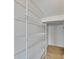 Bright walk-in closet offers wire shelving and durable flooring at 1806 Mira Lago Cir, Ruskin, FL 33570
