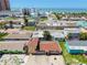 Aerial view of a single Gathering home near a beach at 18102 2Nd St E, Redington Shores, FL 33708