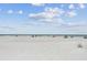 The pristine white sand beach with crystal clear waters is waiting to be explored at 18102 2Nd St E, Redington Shores, FL 33708