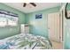 Bedroom featuring a queen bed, neutral walls, and a chest of drawers at 18102 2Nd St E, Redington Shores, FL 33708