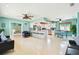 Spacious open-concept living room featuring modern design elements and abundant natural light at 18102 2Nd St E, Redington Shores, FL 33708