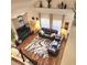 Spacious living room featuring comfortable seating, large windows, and a stylish rug at 1830 Citrus Orchard Way, Valrico, FL 33594