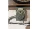 A close up of a grey-colored electrical outlet at 1830 Citrus Orchard Way, Valrico, FL 33594