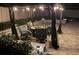 Outdoor patio with a gazebo, string lights, and comfortable seating, ideal for evening gatherings at 1830 Citrus Orchard Way, Valrico, FL 33594