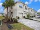 Charming two-story home with two-car garage, paved driveway, and inviting curb appeal at 19153 Elsimont Isle, Lutz, FL 33558