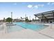 Resort-style pool with lounge seating and fountains for relaxation at 19153 Elsimont Isle, Lutz, FL 33558