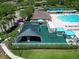 Community playground features shade and soft surface area for Gathering fun, next to clubhouse, pool and courts at 19337 Weymouth Dr, Land O Lakes, FL 34638