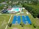 Community amenities include basketball and tennis courts, large pool, and lush landscaping for an active lifestyle at 19337 Weymouth Dr, Land O Lakes, FL 34638