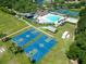 Aerial view of community amenities including pool, basketball courts, and more at 19337 Weymouth Dr, Land O Lakes, FL 34638