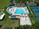 Aerial view of community amenities including pool, basketball courts, and more at 19337 Weymouth Dr, Land O Lakes, FL 34638