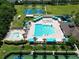 Aerial view of community amenities including pool, basketball courts, and more at 19337 Weymouth Dr, Land O Lakes, FL 34638