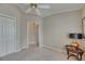 Bright bedroom with carpet flooring, closet, and neutral paint at 2017 S Pebble Beach Blvd, Sun City Center, FL 33573