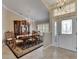Formal dining room with chandelier, shuttered window, and elegant furnishings at 2017 S Pebble Beach Blvd, Sun City Center, FL 33573