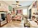 Bedroom view showing decor, ceiling fan and light hardwood floors at 21422 Draycott Way, Land O Lakes, FL 34637