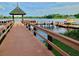 Community dock on the lake with gazebo and kayak landing at 21422 Draycott Way, Land O Lakes, FL 34637