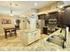 Spacious kitchen offering stainless steel appliances, an island with bar seating, and tile flooring at 21422 Draycott Way, Land O Lakes, FL 34637