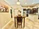 Updated kitchen boasting stainless steel appliances, island with granite counter and a breakfast table at 21422 Draycott Way, Land O Lakes, FL 34637