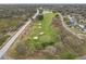Overhead view of a golf course featuring multiple sand traps and manicured greens at 2190 Fairway S Ave, St Petersburg, FL 33712
