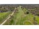 Scenic aerial of golf course featuring lush green fairways and mature trees at 2190 Fairway S Ave, St Petersburg, FL 33712