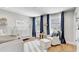 Bright Bedroom with wood floors and lots of natural light from two large windows at 2190 Fairway S Ave, St Petersburg, FL 33712
