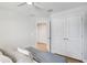 Bedroom with hardwood floors, a bed, and a closet with white double doors at 2190 Fairway S Ave, St Petersburg, FL 33712