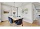 Bright dining room featuring a modern chandelier and stylish decor at 2190 Fairway S Ave, St Petersburg, FL 33712