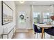 Elegant foyer with hardwood floors, a glass door and large windows with natural light at 2190 Fairway S Ave, St Petersburg, FL 33712