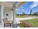 Relaxing front porch view with comfortable seating and colorful landscaping at 2190 Fairway S Ave, St Petersburg, FL 33712