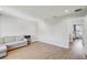 Spare room with a sleeper sofa and open floor plan at 2190 Fairway S Ave, St Petersburg, FL 33712