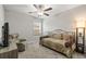 Cozy bedroom featuring a daybed, ceiling fan, and comfortable seating at 233 Cascade Bend Dr, Ruskin, FL 33570