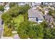 Expansive home with a large backyard surrounded by mature trees, offering privacy at 2501 S Dundee St, Tampa, FL 33629