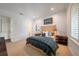 Bright bedroom with plush carpet, plantation shutters, and stylish furnishings at 2501 S Dundee St, Tampa, FL 33629