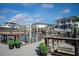 Waterfront property featuring a private dock with boat lift, stunning home, and lush landscaping at 2501 S Dundee St, Tampa, FL 33629