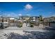 A view of a modern dock extending onto the waterway with lush landscaping and boats nearby at 2501 S Dundee St, Tampa, FL 33629